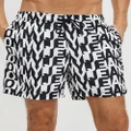Tommy Hilfiger - Essential Print Medium Drawstring Boardshorts - Swimwear (Logomania) Essential Print Medium Drawstring Boardshorts