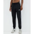 adidas Sportswear - Essentials French Terry Tapered Cuff 3 Stripes Pants - Pants (Black & White) Essentials French Terry Tapered Cuff 3-Stripes Pants