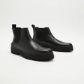 Tommy Hilfiger - Bianka 8A Casual Leather Flat Boots Women's - Boots (Black) Bianka 8A Casual Leather Flat Boots - Women's