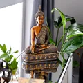 Deco 79 Polystone Buddha Meditating Sculpture with Engraved Carvings and Relief Detailing, 12" x 6" x 15", Brown