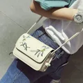 Mini Slingbag with Embroidered Flowers