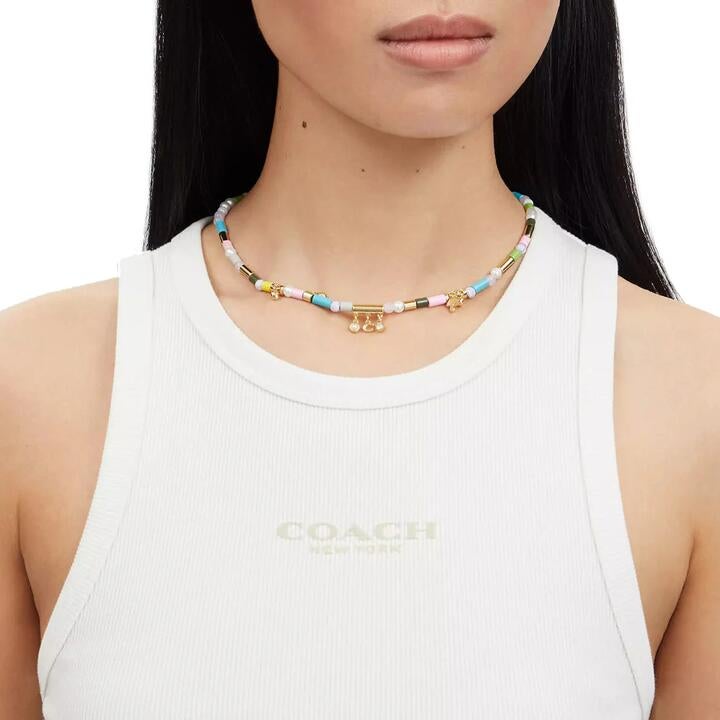 Coach Heart Multi Charm Beaded Necklace In Gold/ Multi Cv264
