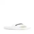 Balenciaga logo-embossed pool slides - White