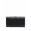 Saint Laurent large flap wallet in grain de poudre embossed leather - Black