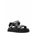 Moschino logo-print flat sandals - Black
