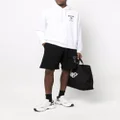 Moschino logo-print track shorts - Black