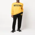 Moschino logo-print straight-leg trousers - Black