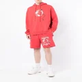 Ksubi graphic-print cotton track shorts - Red