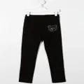 Moschino Kids embellished-logo detail trousers - Black
