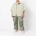 Engineered Garments straight-leg leaf-print trousers - Green