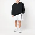 Alexander McQueen Graffiti-print cotton track shorts - White