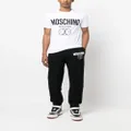 Moschino smile logo cotton track trousers - Black