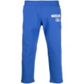 Moschino logo-print organic-cotton track pants - Blue