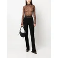 ANDREĀDAMO cut-out ribbed-knit trousers - Black