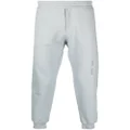 Alexander McQueen logo-print cotton track pants - Grey