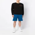 Alexander McQueen logo-tape cotton track shorts - Blue
