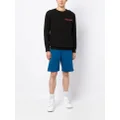 Alexander McQueen logo-tape cotton track shorts - Blue