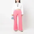 Moschino pressed-crease flared trousers - Pink