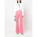 Moschino pressed-crease flared trousers - Pink