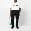 MSGM logo-waistband tapered trousers - Black