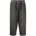 izzue faded-effect drawstring track pants - Grey