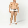 Dolce & Gabbana logo-patch high-leg swim shorts - White