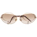 Dolce & Gabbana Pre-Owned 2000s cut-out arms oversize frame sunglasses - Gold