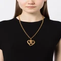 CHANEL Pre-Owned 1995 CC heart pendant necklace - Gold