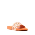 Moncler embossed-logo slides - Orange