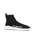 Love Moschino logo print slip-on sneakers - Black