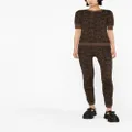 Moschino logo-printed knitted leggings - Brown