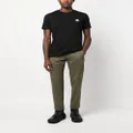 Moncler logo-patch twill tapered-leg trousers - Green