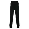Moschino logo-print cotton track pants - Black