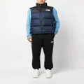 The North Face logo-embroidered padded gilet - Blue