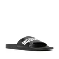 Moschino logo-debossed open-toe slides - Black