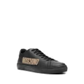 Moschino logo-embossed leather sneakers - Black