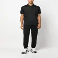 Calvin Klein logo-patch zip-up polo shirt - Black