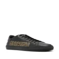 Moschino logo-debossed leather sneakers - Black