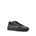 Moschino logo-debossed leather sneakers - Black