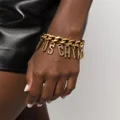Moschino logo-charm Cuban-chain bracelet - Gold