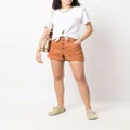 ISABEL MARANT button-fastening cotton shorts - Orange