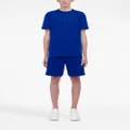 Alexander McQueen embroidered logo track shorts - Blue