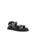 Moschino logo-embroidered touch-strap sandals - Black