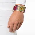 Moschino logo-engraved graphic-print bracelet - Pink