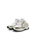 CHANEL Pre-Owned CC logo-appliqué panelled sneakers - White