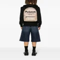 Alexander McQueen Graffiti Metropolitan logo-print backpack - Neutrals