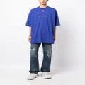 VETEMENTS x Apple slogan-print cotton T-shirt - Blue