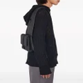 Ferragamo asymmetric faux-leather messenger bag - Black