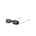 Nanushka Chic oval-frame sunglasses - Black