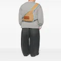 Acne Studios logo-patch sling backpack - Neutrals